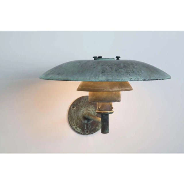 Large Poul Henningsen 'PH Wall' Darkly patinated outdoor lamp for Louis Poulsen. The PH Wall is part of the revolutionary...