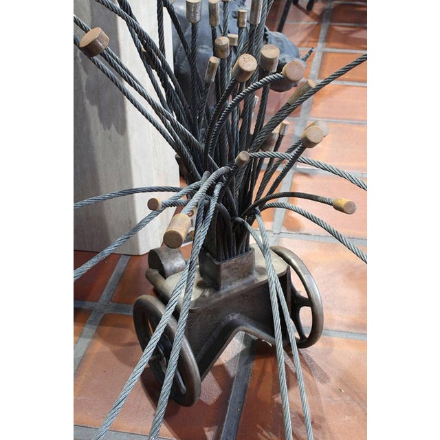 Bella Feldman (American, b. 1930), Untitled, metal 2-wheeled cart with metal cables, (Provenance: Allan Stone Gallery, New...