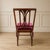 Bring rich character and tailored elegance to your space with this Vintage Plum Velvet Pierced-Back Dining Chair. The dark...