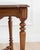 A refined Italian 19th century walnut writing desk, distinguished by its balanced proportions and elegant neoclassical...