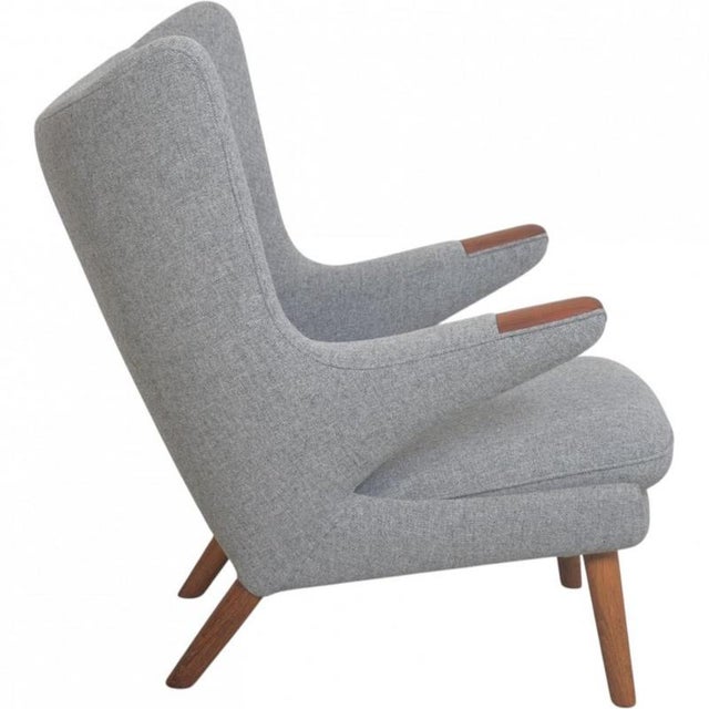 Hans Wegner Papa Bear chair, model AP19, fully upholstered in grey Hallingdal 130 fabric, with oiled oak legs and teak...