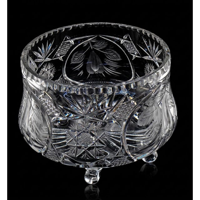Elevate your tablescape or collection with this exceptional, heavy-cut lead crystal centerpiece bowl from the American...