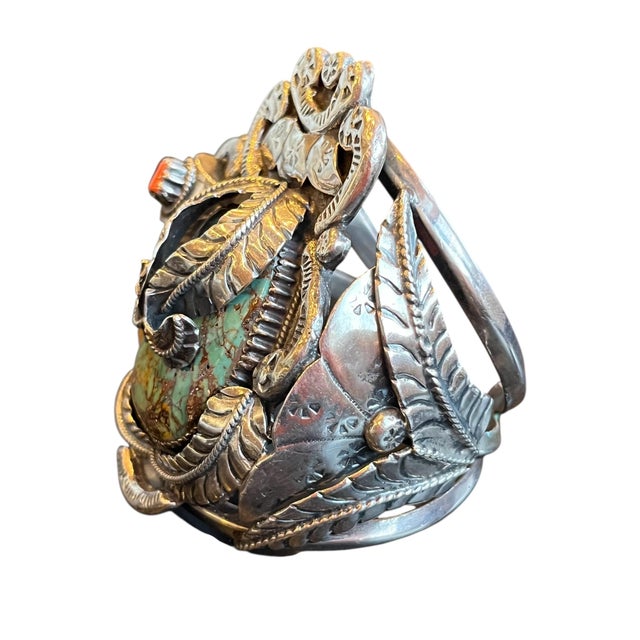 A Beautiful Heavy Sterling Silver Turquoise Bracelet with Coral, Bear Claw, Snake, Alligator, and Leaves., Signed Kakik...