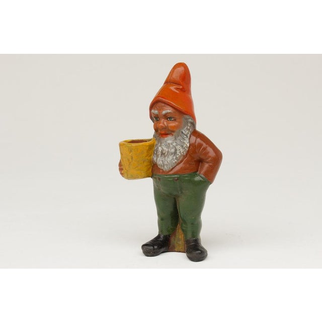 Small terracotta garden gnome, produced in Germany in the 1960s. Manufacturer: Clemens Spang I have official proof of...