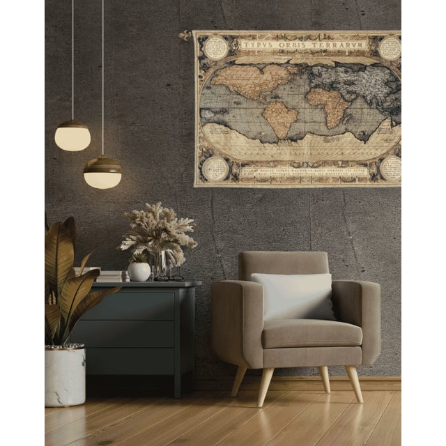 This beautiful tapestry is a woven reproduction of an early 17th Century world map originally designed by the Dutch...
