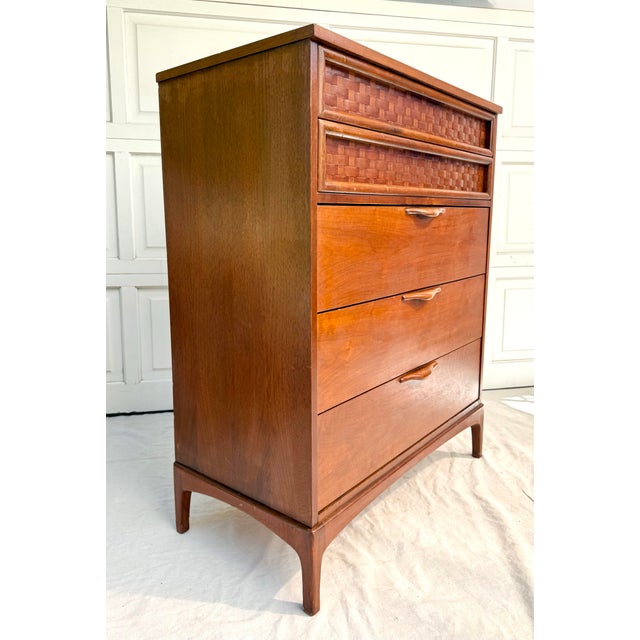 Here is a wonderful mid-century walnut highboy dresser, attributed to Lane Furniture and dating to the 1960s. This piece...