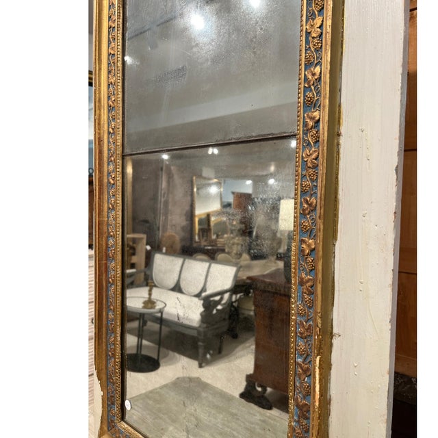 This elegant 18th-century French mirror reflects the refined transition between the Louis XVI and Directoire periods,...