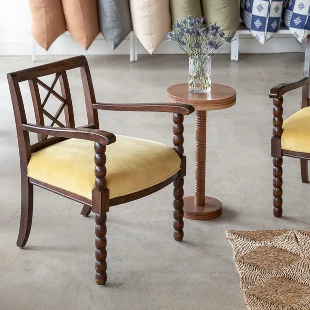 Incredible pair of carved wood armchairs from France, 1940s. Beautiful carved bobbin wood legs and criss-cross detailing...