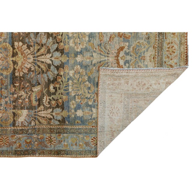 Elevate your space with this exquisite late 19th-century Antique Malayer hand-knotted wool rug. Celebrated by interior...