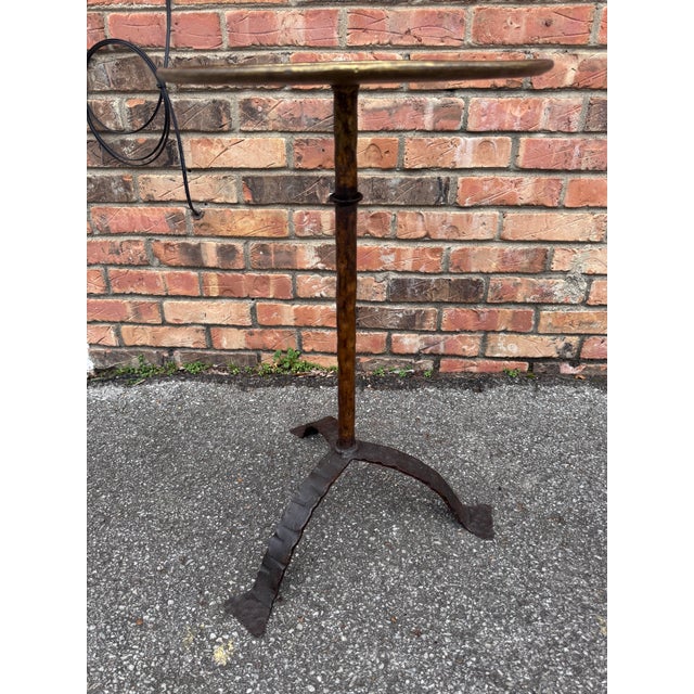This is wonderful little Spanish made wrought iron drink table with an antiqued gold finish. It is contemporary yet...