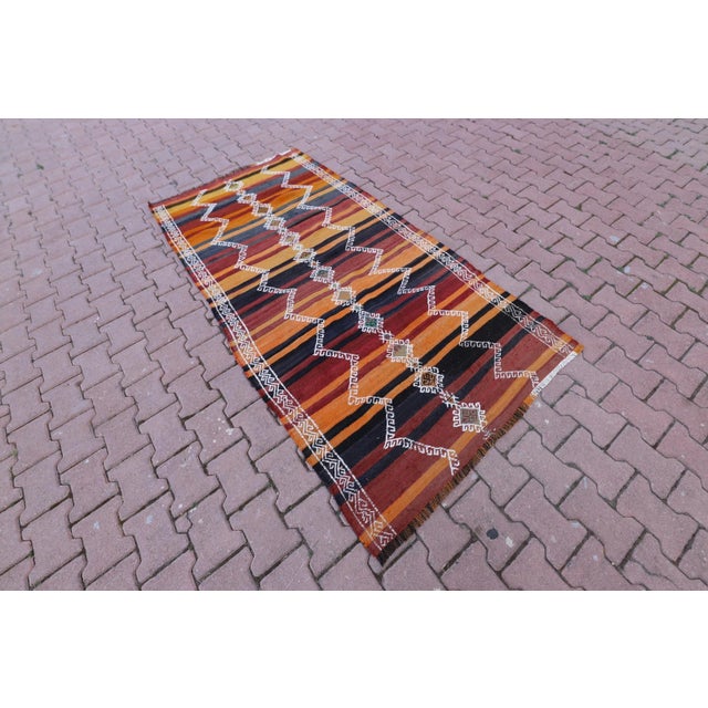 1960s Tribal Orange Striped Wool Handmade Kilim Rug Size: 3.9 x 7.6 ft ( 116 x 230 cm) 45 x 90 inches Color: Organic...
