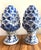 Rare vintage set / 2 artichoke / pinecone finials in classic botanical blue and white design Each 7” d x 14” h No maker’s...