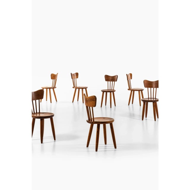 Rare set of 10 dining chairs designed by Torsten Claeson. Produced by Steneby Hemslöjd in Sweden. Retailed at Meeths in...