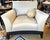 Classic styled fully upholstered and fringe skirted swiveling armchair fit for a king by high-end designer Marge Carson...
