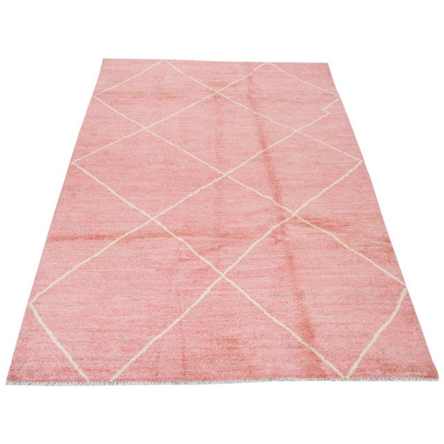 Modern Moroccan Beni Ourain hand knotted wool rug with soft texture.
