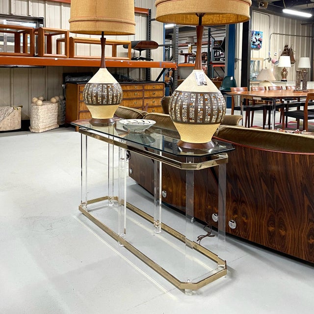 This fabulous Nineteen-Laties (vintage 1970s-1980s) Lucite console table is ideal for placement behind a sofa, hence the...