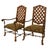 A Pair of Walnut Fireside Lattice High Back Armchairs are elegant and comfortable pieces made from rich, durable walnut...