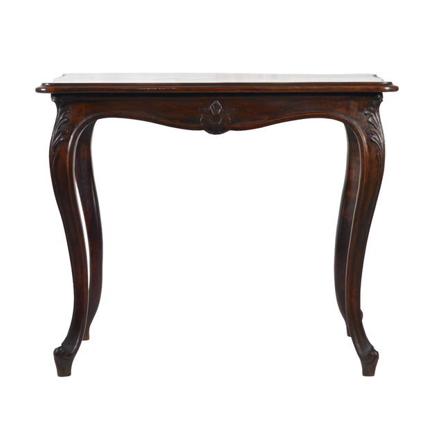 This elegant louis xv style side table, crafted in france during the late 19th century, is a refined example of the...