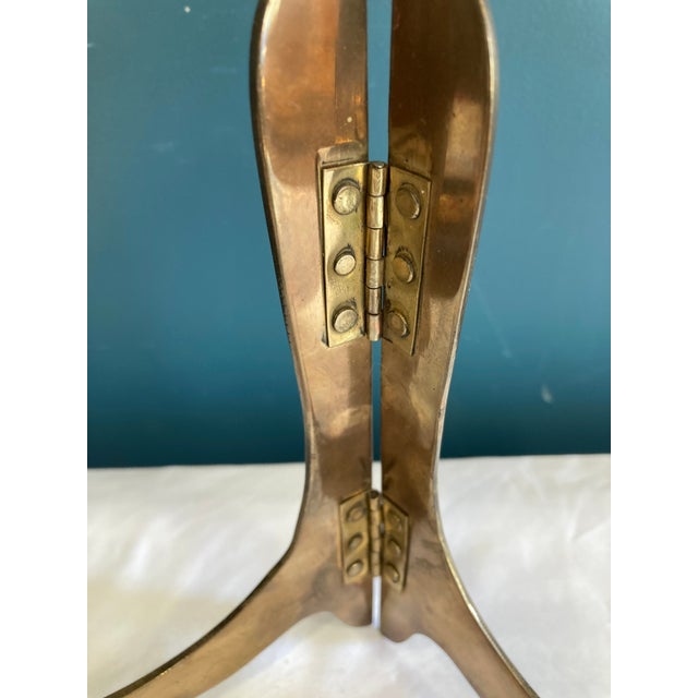 This exquisite vintage brass folding easel represents the finest in Mid-Century Modern functional design. Among...