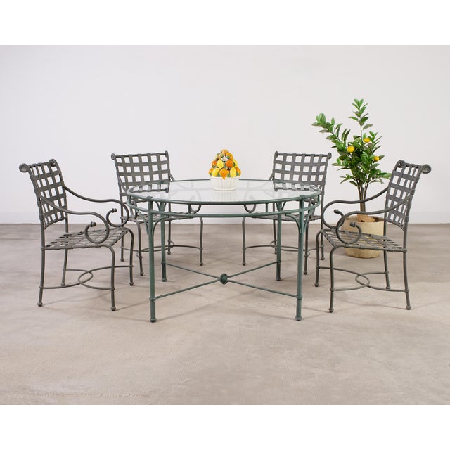 Genuine labeled patio and garden dining set designed by Richard Frinier for Brown Jordan. The set consists of four dining...