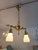 An Authentic 2 Light Edwardian Aladdin Pan Fixture with 2 Antique milk glass colonial Glass Shades. The fixture is solid...