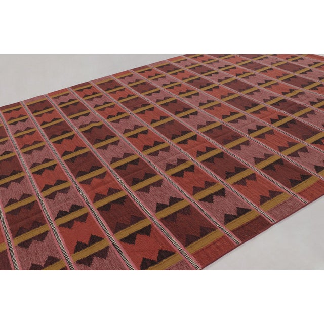 Handwoven in premium New Zealand wool, this 10x14 flatweave is a premier selection from our contemporary Scandinavian rug...