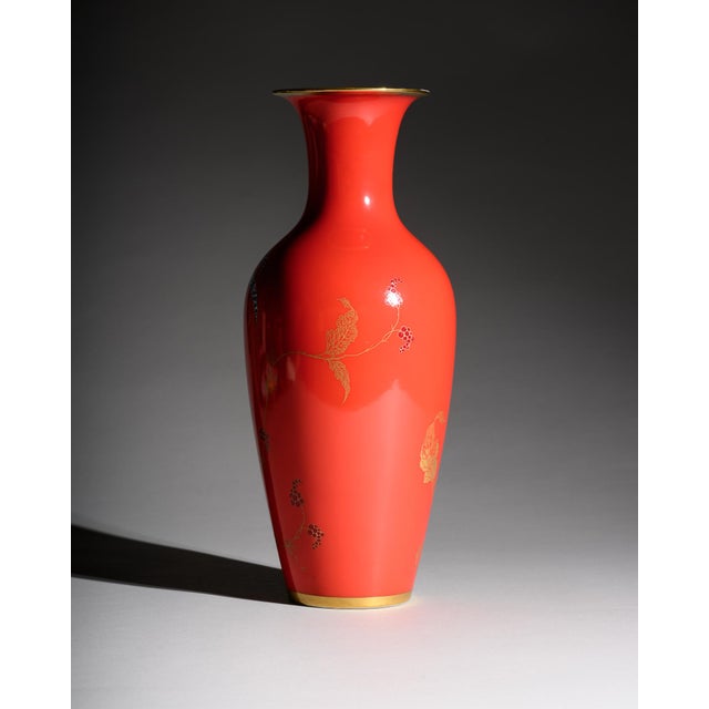 Large Rosenthal porcelain floor vase produced in Germany in 1938. The vase has a glossy coral-red ground decorated with a...
