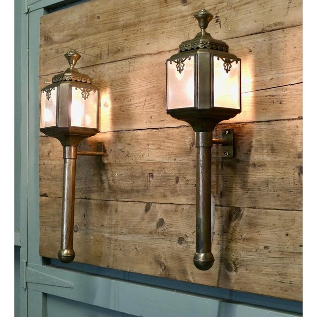 A Pair of French Brass Carriage Lamps, Wall Lanterns An original Pair of 4 sided Brass Carriage lights now wired for...
