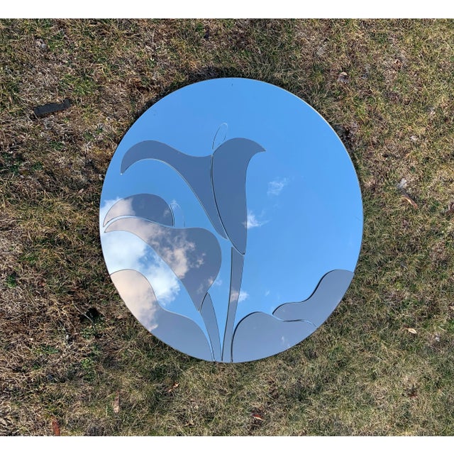 Vintage 80's wall mirror with beautiful calla Lily design in the style of David Marshall. Gray/ slightly pink tinted glass...