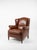 Elevate your interior with this beautifully crafted vintage wingchair in a rich tobacco brown leather colourway. Its...