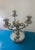 Vintage centerpiece candle holder with vase, made by Godinger. The center vase is surrounded by three candle holders with...