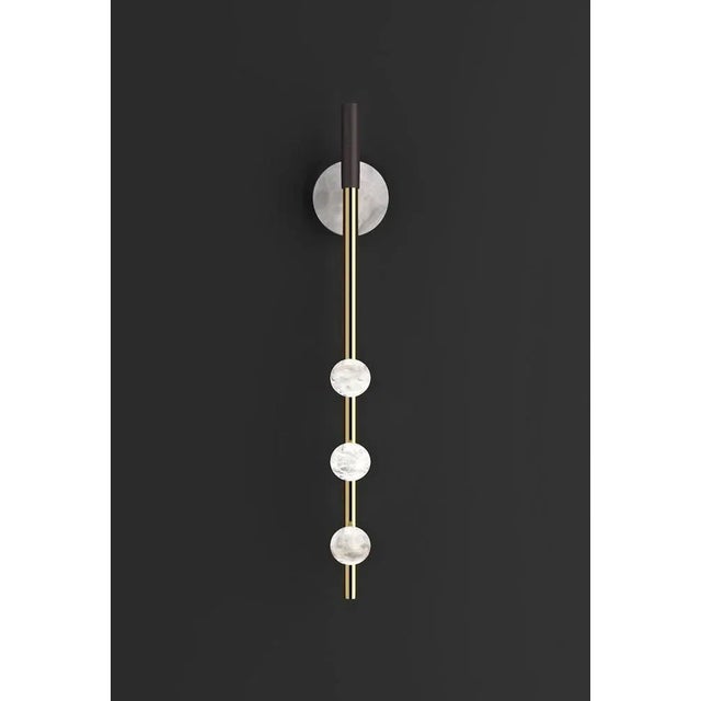 Demetra shiny gold metal wall lamp by alabastro italiano dimensions: d 9 x w 10 x h 60 cm. Materials: white alabaster,...