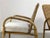 An elegant pair of armchairs, modernist, libre shape, shabby-chic, bamboo structures folded with fine and rounded lines,...