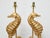 A pair of gilt metal seahorse fragments, transformed into sculptural table lamps and mounted on custom lucite bases. These...