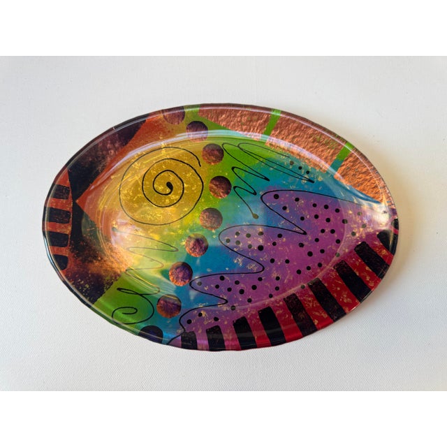Colorful hand-painted art glass plate by Nancy Fiala of Fiala Design Works, Washington State. Features a playful abstract...