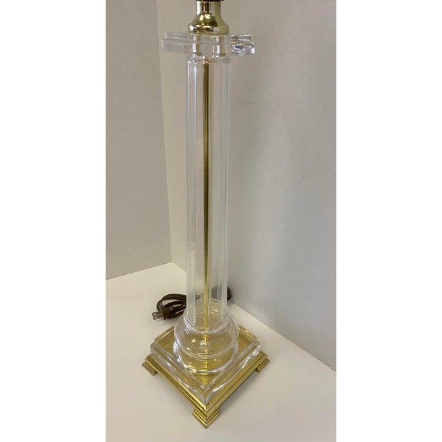 Very Glassy Hollywood Regency Glass and Brass Column Table Lamp. Add a bit of sparkle to your decor.