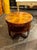 The French Art Deco Black Walnut Side Table is a stylish and elegant piece of furniture that adds a touch of...