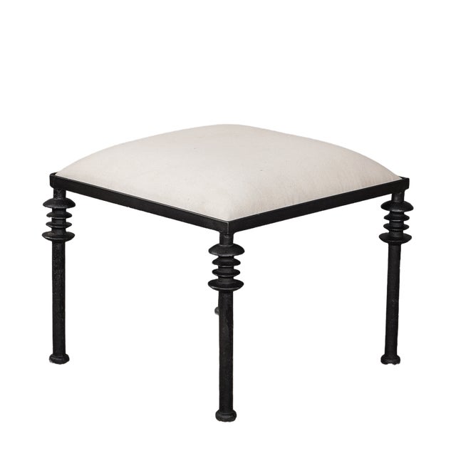 Crafted with stacked iron details and linen upholstered seat cushion Backordered with Late August 2025 ship-out date...
