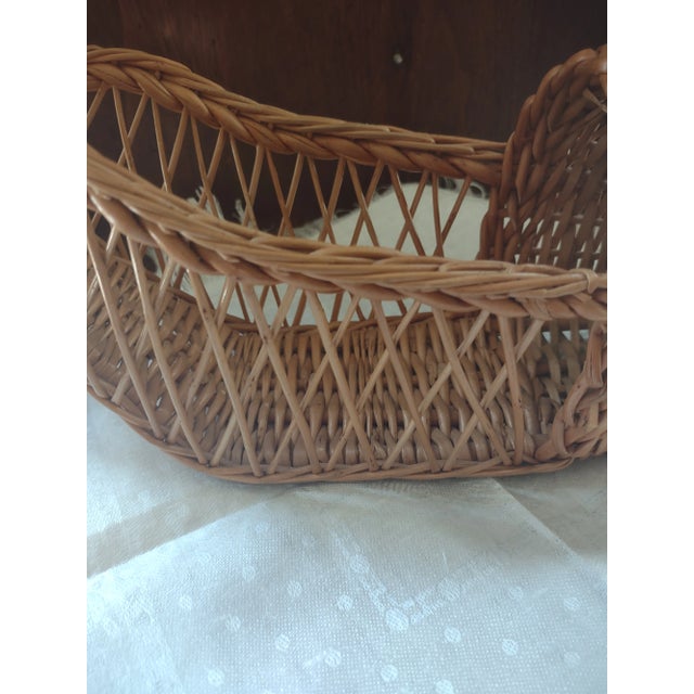 Offered is a vintage wicker wine holder. It measures 14.5" by 5" by 6 1/2" tall. It is in excellent shape and will set off...