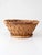 Beautiful vintage handwoven basket with a generous, rounded form, intricately patterned weave, wrapped rim, and raised...