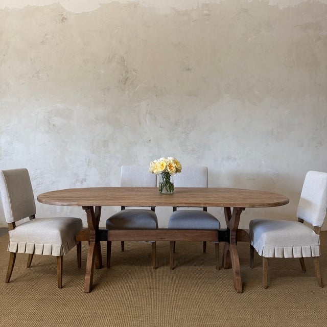 The Costa Dining Table is crafted from solid reclaimed fir & pine and finished in a weathered natural finish, this oval...