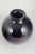 Harald Notini for Pukebergs Glasbruk “Cryopas”, Art Deco, 1920s/30s. Mouth-blown Art Deco glass vase in a deep, near-black...