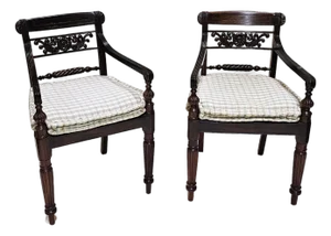 A Pair of Anglo-Indian Hardwood and Caned Armchairs