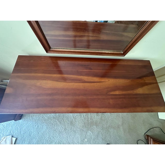 This cherry dresser lived in my parents’ bedroom for over 70 years. Its fine solid wood construction means it’s fully...
