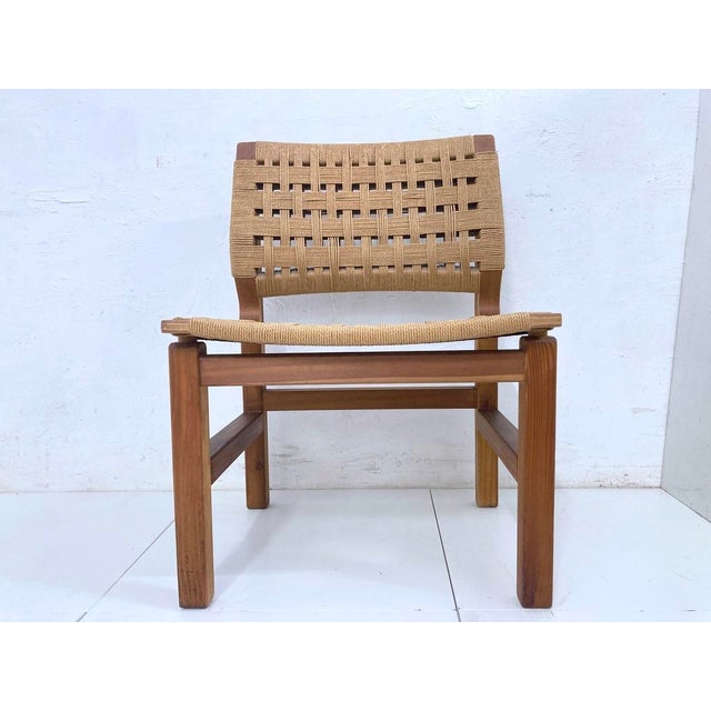 1 chair from the 1960s and 1970s, designed by Vagn M. Fuglsang for Collectio Fuglsang. Wood (pine), cord upholstery....