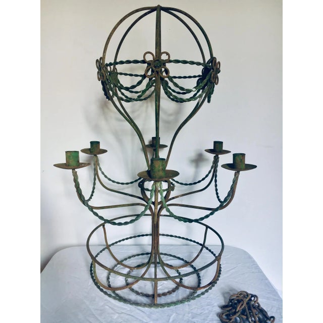 Mid century 6 light [currently for candles, can be electrified] Verdigris Patinated wrought iron chandelier. Perfect for...