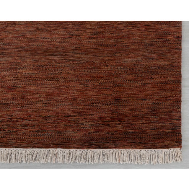 Featuring a super soft wool surface, the rug is easy to wash and maintain. Every inch of this rug is made by hand.