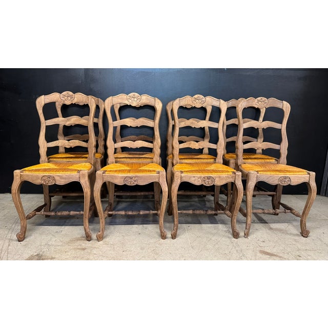 A good looking set of 8 French Farmhouse Dining Chairs. Dating to the early 1900s we have bleached them for a lighter...