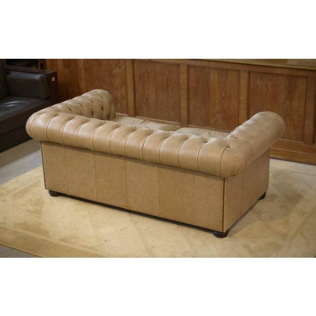 Vintage English Chesterfield Sofa in Beige Leather, 1990s, in Very Good conditions. Designed 1990 to 1999 This piece has...