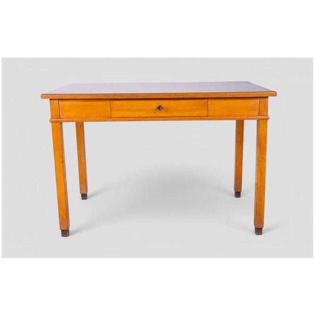 with its clean and elegant lines, this vintage 1950s desk is an authentic piece of furniture with rationalist charm. The...